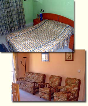 The living room and main bedroom